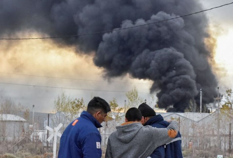 After a refinery explosion kills three people, Argentine oil workers go on strike.